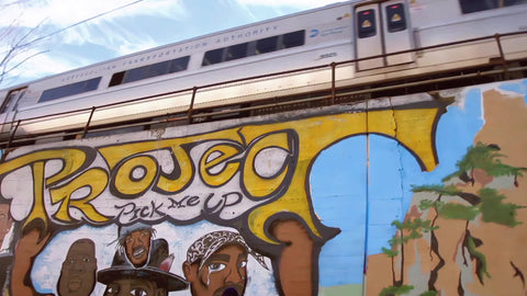 Hip Hop mural Project Pick Me Up with elevated subway train in Jamaica Queens New York City