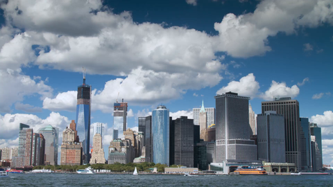daytime timelapse of Downtown Manhattan skyline with Freedom Tower and skyscrapers - 4K in NYC