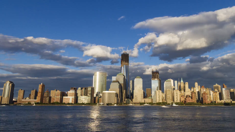 Freedom Tower in the Manhattan skyline from day to night - 4K timelapse in NYC