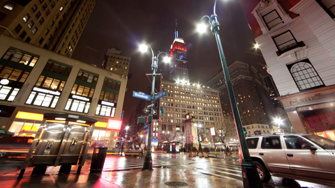 Empire State Building view from Herald Square on corner of Broadway and 35th st near 34th Street in Manhattan - 4k timelapse at night in NYC