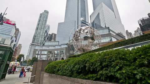 famous steel glob sculpture at Columbus Circle in Manhattan on summer day in NYC