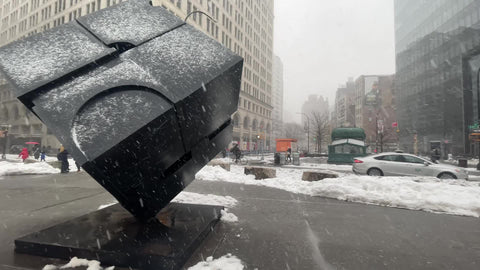 cube sculpture in snow storm blizzard snowing in Manhattan New York City NYC
