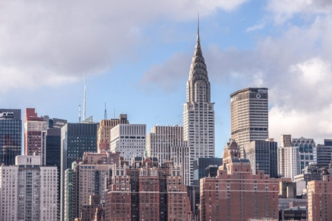Chrysler Building and Met-Life skyscraper on beautiful summer day with blue sky in Manhattan NYC