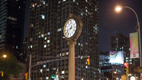 zooming out from famous 5th Ave clock in Flatiron - timelapse in Manhattan in 4K and 1080 HD in NYC