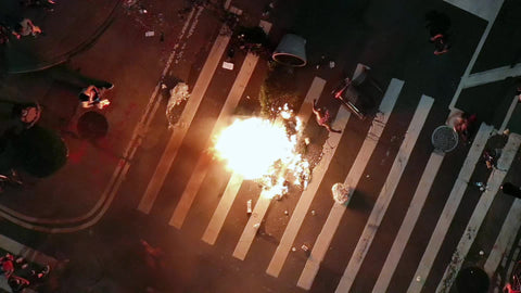 fire - overhead view of riot protestors on crosswalk in New York City at night