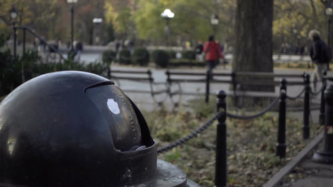 closeup of garbage can - trash bin in Washington Square Park on fall day