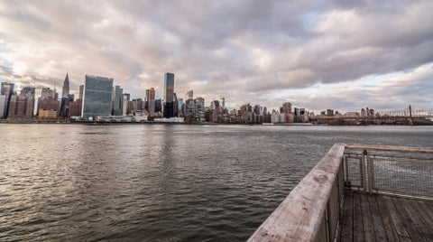 Manhattan skyline with UN Building from across East River in late afternoon viewed from Brooklyn