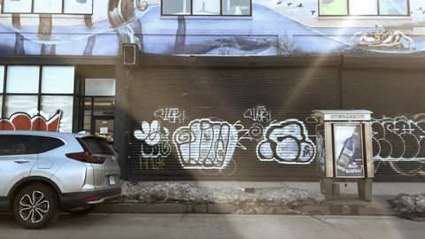 driving past colorful graffiti on West Side Highway Midtown Manhattan New York City NYC