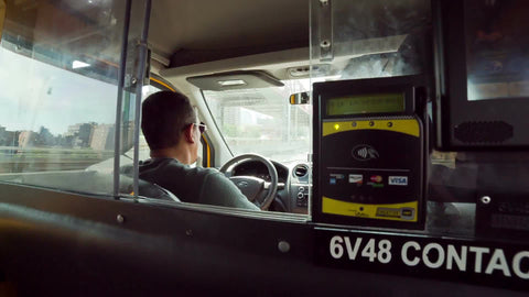 interior view from backseat of taxicab - taxi driver - driving cab in NYC