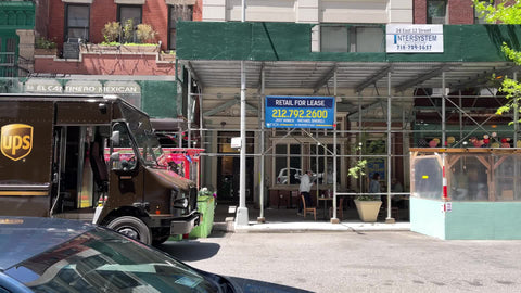 retail space for lease sign on closed store outside in Manhattan New York City NYC