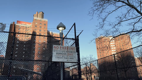 Smith housing project red brick buildings projects with no parking sign on fence Lower East Side LES New York City NYC