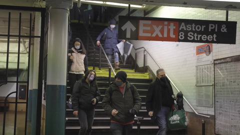 people with masks entering Astor Place 8 Street subway staircase train station stairs New York City NYC