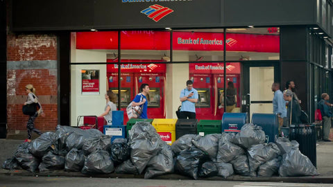 trash bags outside Bank of America - garbage pile