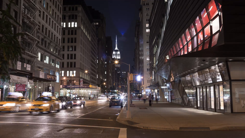 Empire State Building at night view from The New School - 4K of cars speeding in timelapse of NYC