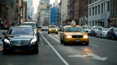taxi cab pulling over on Lafayette Street in Manhattan NYC