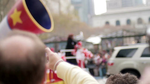 Gloria Gaynor on Macy's Thanksgiving Day Parade float with cheerleaders shaking pompoms in Midtown Manhattan NYC