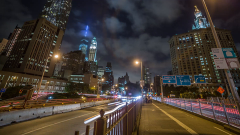 Downtown Manhattan at night coming off Brooklyn Bridge to FDR Drive - 4K timelapse in New York