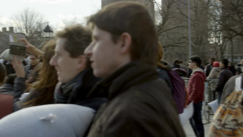 NYU students having pillow fight in Washington Square Park - slow motion in 4K and 1080 HD in NYC