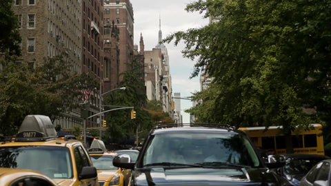 crossing 5th Ave and Taxicabs waiting at crosswalk on summer day - Empire State Building view from Lower Fifth Avenue