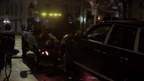 NYPD tow truck waiting at night, dragging car away - towing vehicle at night