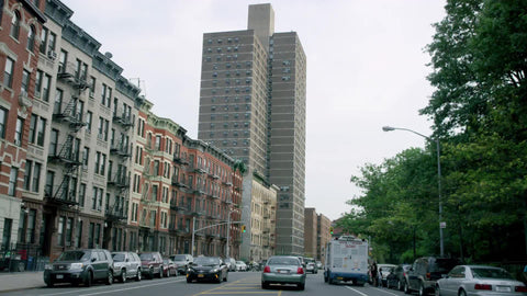 driving through the Bronx - ice cream truck and tenement buildings in New York City