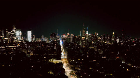 Manhattan cityscape afterhours buildings lights out at night New York City NYC
