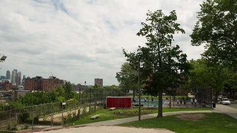 panning view of Manhattan skyline from New Jersey on summer day