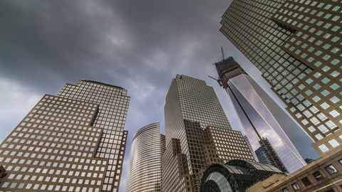 Battery Park with tall buildings overhead - Freedom Tower under construction - timelapse in Manhattan 4K and 1080 HD NYC