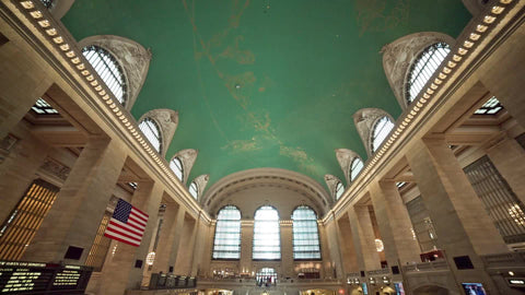 tilting from ceiling to stairs inside Grand Central Station in NYC
