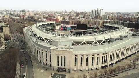 Yankee Stadium aerial across front right to left - flying over the Bronx New York City in 4K and 1080 HD