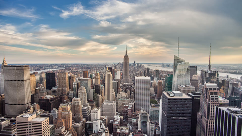Empire State Building cityscape 4K timelapse day to night - skyscrapers in Manhattan