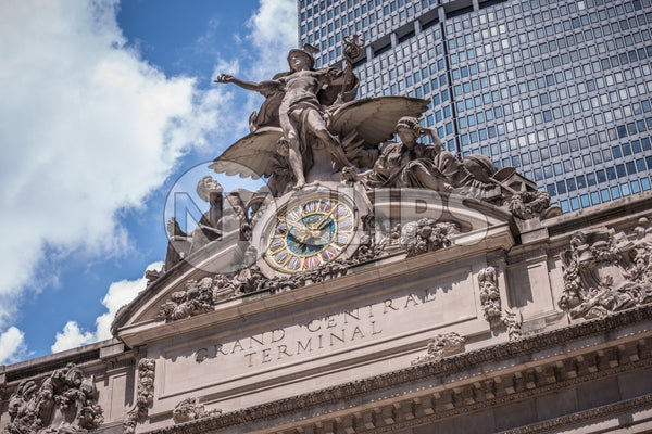 closeup shot of statue and clock on Grand Central Station Terminal exterior in Manhattan