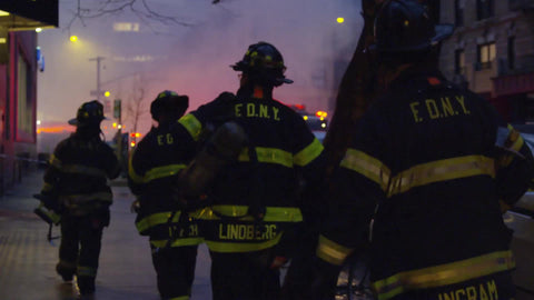 firefighters walking toward smoke - FDNY firemen in uniform at night in 1080 HD and 4K in NYC