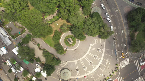 aerial dropping down on George Washington statue in circle in Union Square New York City NYC