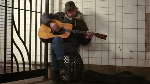 blues guitarist in subway - musician playing guitar in the train station 1080 HD in NYC