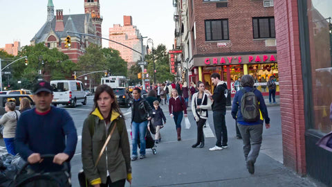 people walking on 6th Avenue - Gray's Papaya on corner of 8th Street - Jefferson Market Library clock tower - Greenwich Village