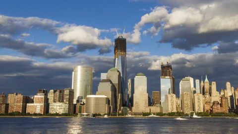 zooming out from Freedom Tower in the Manhattan skyline - 4K timelapse day to night in NYC