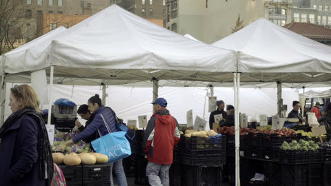Union Square Farmers Market in autumn people and fruit vegetables stand Fall in New York City