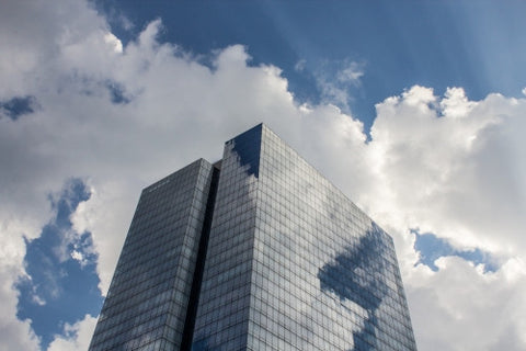 glass condominium in the Bronx on blue sky