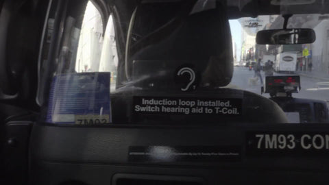 backseat view of taxicab interior in NYC