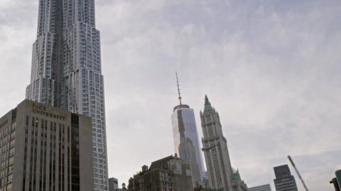 Chambers Street and Centre St sign in Lower Downtown Manhattan with Freedom Tower, exiting Brooklyn Bridge from driver pov in NYC
