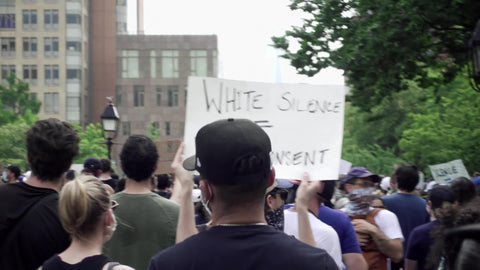 white silence equals white consent sign at Black Lives Matter rally in New York City