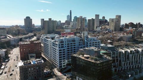 pushing in close toward welcome sign in Brooklyn New York City