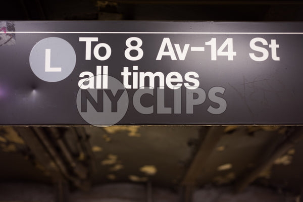 L train all times sign in 8th Ave and 14th st subway station