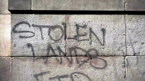 Stolen Lands FTP graffiti on stone wall of Washington Square Park arch New York City