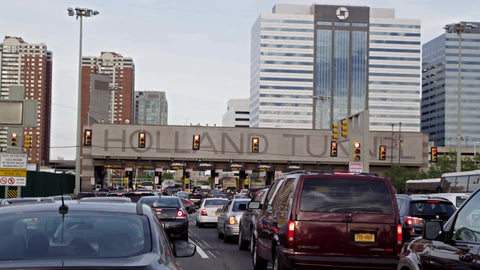 panning cars in traffic - lined up entering Holland Tunnel