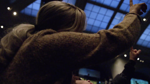 mother and child looking up at blue whale on ceiling in Natural History Museum in 1080p HD and 4K NYC
