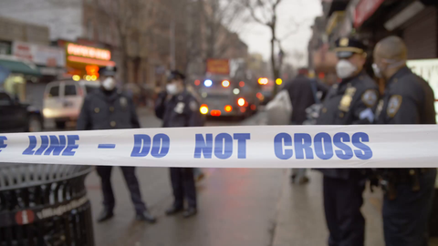 police line blocking crime scene - do not cross tape on Lower East Side in Manhattan 4K NYC