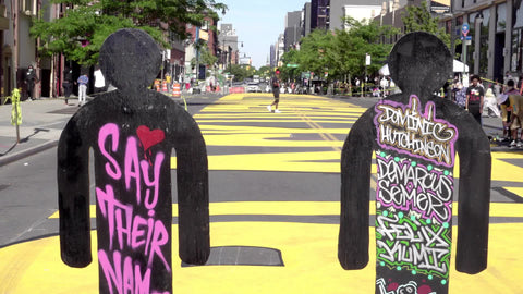 Say Their Names art installment commemorating Black people murdered by police - silhouettes of victims of police brutality - Brooklyn New York City