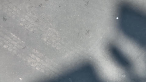 Rucker Park leaf logo on basketball court zooming out aerial drone view Harlem New York City NYC